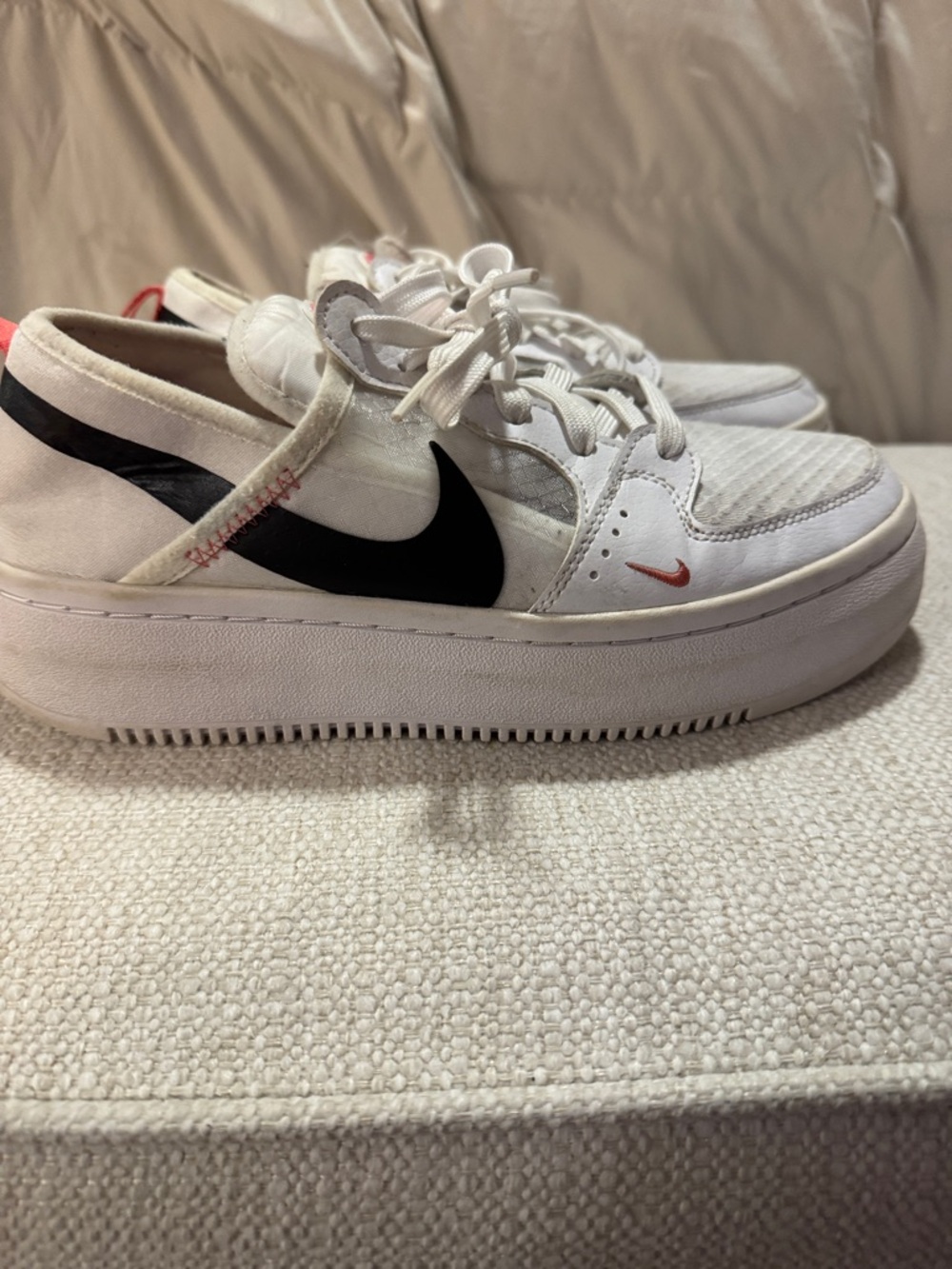 Nike Women’s White Sneakers with Black Swoosh and Pink Accent